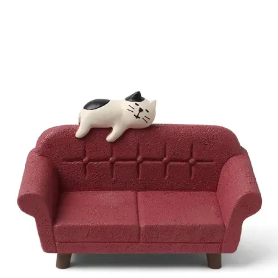 "Miya Company Handcrafted Cat Figurine on Red Velvet Sofa - Decorative Collectible Statue"